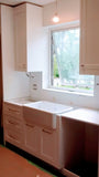 Beautiful & elegant custom build white recessed solid wood paneled cabinetry with a timeless farmhouse sink, a custom hood and dishwasher cover serves as a clean slate for beautiful walnut wood island, a playful balance of traditional and modern. Solid walnut wood with 2.5" frame, 6 flat panel drawers and a microwave shelf. A perfect example of contrasting textures mixed to keep it family friendly, and at the same time a strong statement piece.