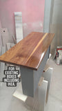 A bland IKEA bathroom vanity was transformed into an elegant modern cabinet by replacing existing fronts with beautiful warm solid walnut  drawer fronts.   Also to customized storage space 3 drawer unit was turned into 2 drawer instead, to accommodate taller items.