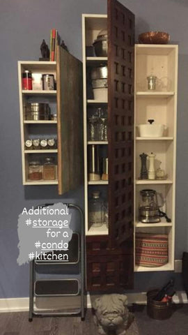 Extra storage for a condo kitchen!  We have put together a very eclectic mix of cabinets to accommodate Katrina's storage needs in her small condo kitchen.  -An amazing spice cabinet with  reclaimed teak wood door panel with original patina & colors, making  it a one of kind piece.  -Sandwiched between is a long cabinet with custom build door &  two drawer panels from rose wood.  -The open shelving  gives her ample space to display her books and artifacts collected over many years of traveling abroad. 