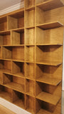 MCM inspired bookcase for a living/dining area - open concept space!   7 ft wide shelves running through from one end to another with open ends.  A  multi functional  sturdy & solidly build from maple plywood standing 8ft tall.