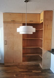 This built-in not only add  lot of storage & display space but also works as a pantry hidden behind the sliding door for a condo with limited space.