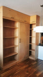 This built-in not only add  lot of storage & display space but also works as a pantry hidden behind the sliding door for a condo with limited space.