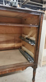 The vintage dresser was modified to accommodate the plumbing  including  new under-mount soft close  drawer boxes with cut outs and white quartz top with an under-mount sink.  Allowing the luxurious vintage look & feel but also the modern convenience & functionality.
