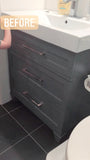 A bland IKEA bathroom vanity was transformed into an elegant modern cabinet by replacing existing fronts with beautiful warm solid walnut drawer fronts. Also to customized storage space 3 drawer unit was turned into 2 drawer instead, to accommodate taller items.