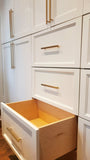 A custom closet, designed to fit this unique & unusual space for a 2nd floor bedroom of a downtown house, Featuring shaker style fronts with bead design and cabinet boxes & drawers boxes build from a gorgeous maple wood plywood. The closets provide ample hanging, drawer, and shelf space for clothing, etc.