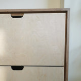 This handsome unit is built from Baltic birch plywood.   Due to the nature of its construction, it is an incredibly durable and void free core allows for a decorative exposed edge.  Cabinet has a  modern ​clean​ &​​ ​streamlined look​, boasting 6 soft close drawer with cut out handle pulls. The shelving is floating between the cabinet & ceiling and has rounded edges
