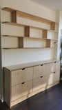 This handsome unit is built from Baltic birch plywood.   Due to the nature of its construction, it is an incredibly durable and void free core allows for a decorative exposed edge.  Cabinet has a  modern ​clean​ &​​ ​streamlined look​, boasting 6 soft close drawer with cut out handle pulls. The shelving is floating between the cabinet & ceiling and has rounded edges