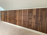 An absolutely spectacular 13 ft long MCM inspired dresser / bedroom unit. Custom build unit boast 9 soft close drawers with under mount slides and 2 door panels on either ends. Which can easily handle all storage needs with ease and still look splendid! Fronts built from beautiful walnut with exceptional grain pattern throughout. The vintage pulls and shell shape handles add a time less feel. A sleek and streamlined white exterior with recessed kick giving it the floating look