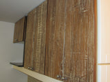 Once confined to the pages of magazines Inde-Art reclaimed wood kitchens are green, warm, unique and affordable.  Custom built reclaimed teak wood with white patina  door & drawer panels  paired with  stainless steel appliance combines rustic warm wood with industrial chic.