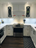 Shaker style cabinets are popular for their timeless style & ability to complement traditional, transitional & modern designs.  Combined with distinctive glass front doors with intersecting narrow strips of wood that divide individual panes of glass – giving the cabinet doors an elegant demeanor well suited for showing off special pieces of china or silver.