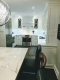 Shaker style cabinets are popular for their timeless style & ability to complement traditional, transitional & modern designs.  Combined with distinctive glass front doors with intersecting narrow strips of wood that divide individual panes of glass – giving the cabinet doors an elegant demeanor well suited for showing off special pieces of china or silver.