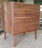 Custom build  MCM inspired 30" solid walnut wood vanity​ cabinet​, featuring a ​soft closing drawer ​and​ solid wood tapered legs. ​ ​With sturdy gold handles adding timeless touch to cabinetry  An elegant addition to any bath space, unique and beautiful texture​d walnut wood makes ​​bathroom classic,​ ​luxurious​ and stunning.