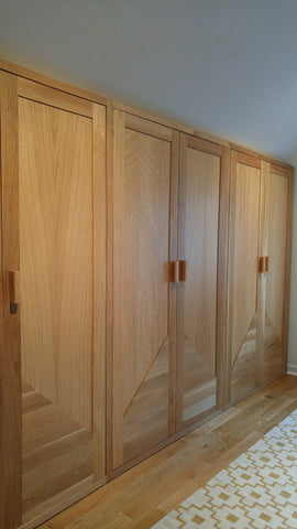 Storage solutions to create both functional and beautiful space - A closet with solid oak wood doors,designed to fit a room with ceiling at an angle.  11.5ft (W) x 6.5ft (HT) x 2ft(D)