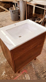 Custom build MCM inspired 30" solid walnut wood vanity​ cabinet​, featuring one deep soft close inset drawer ​, tapered wood legs, quartz countertop  with gray veins and a ceramic sink. 