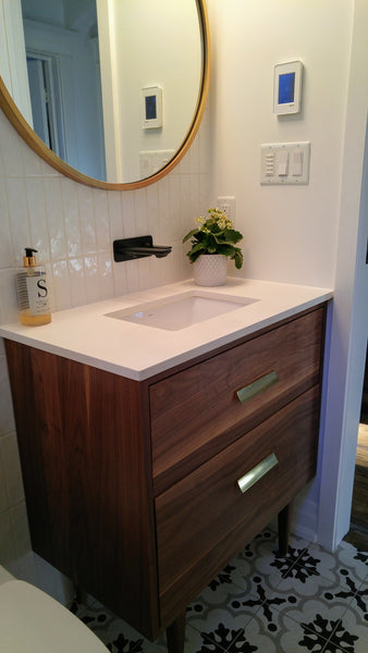 Custom build 30" solid walnut wood vanity​ cabinet​, featuring ceramic ​under-mount​ sink and white quartz countertop, ​soft closing drawers ​and​ solid wood tapered legs. ​ ​ An elegant addition to any bath space, unique and beautiful texture​d walnut wood makes ​b​bathroom classic,​ ​luxurious​ and stunning.