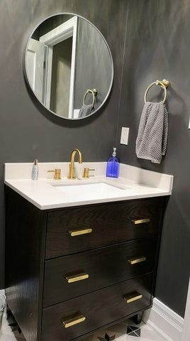 Shown in the photos is a 30" wide custom vanity.  Soft close drawers & interior cabinet made from furniture-grade, high quality maple plywood stained to match drawer fronts built from solid oak wood.   30" W x  20" D x  33.5" (ht)