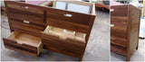 Solid walnut wood custom build vanity cabinet with 6 flat panel inset drawers.