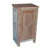 Solid reclaimed wood cabinet with  salvaged side panels and hand carved door.
