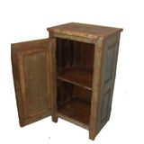 Solid reclaimed wood cabinet with  salvaged side panels and hand carved door.