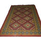Hand woven woolen  rug in assorted colors and designs