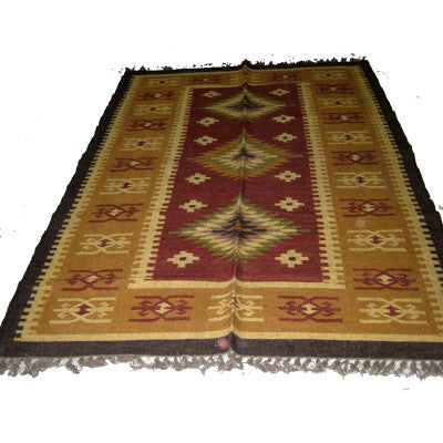 Hand woven woolen  rug in assorted colors and designs