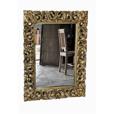 Hand craved solid wood mirror frame in gold color.