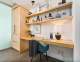 Don’t think you have the space for a home office? Think again  In this condo, hallway becomes a home office. To make the most of the space, a floating desk and shelving above it makes room for books,etc  Made from solid poplar wood.