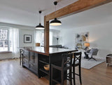 We built this amazing island with solid maple wood counter top for Neve last summer. This time around it was time to add a rustic architectural feature to this beautiful kitchen by covering the post & beam with solid maple wood.