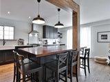 We built this amazing island with solid maple wood counter top for Neve last summer. This time around it was time to add a rustic architectural feature to this beautiful kitchen by covering the post & beam with solid maple wood.