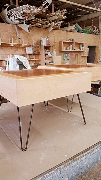 Re-configuring an existing office boardroom table!! A well loved & liked vintage boardroom table  was  reconfigured into a smaller size coffee table and 2 end tables. Hair pin metal legs give pieces mid century modern aesthetics. Upcycle + Recycle + Reuse + Makeover