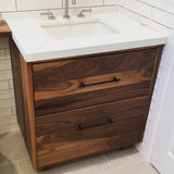 Shown in the photos is a 31" wide custom vanity cabinet built from gorgeous solid walnut wood.
