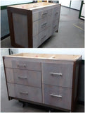 We designed this stunning island for to maximize storage need for a growing family.  - Drawer fronts built from reclaimed teak wood  - Paneled back & sides  - A playful balance of casual and sophisticated.