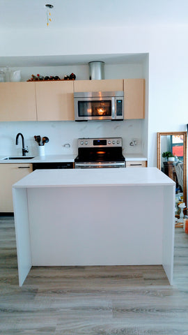 The Island brings style and functionality to this kitchen. The large tabletop provides an open work area. Side facing the kitchen has two deep shelves for additional storage . Perfect for cook books, pots, pans or kitchen appliances handy when you need them. The other side is designed to accommodate seating with comfortable leg room. 53" x 30 x 36"