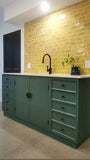 This eclectic kitchen was inspired by Liz love for all thing MCM. A fresh and modern take on a vintage ​cabinets!  ​ A contemporary re-interpretation  by combing old & new and  pulling them together by painting them same color. Turning this space into a modern oasis, full of color , textures and patterns.