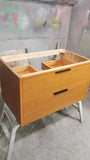 36" wide wall​ mounted / floating solid oak vanity built from solid white oak and stained teak color. ​ Design is inspired by Liz's love for MCM furniture - A​  ​modern ​clean​ &​​ ​streamlined look​ with two soft close drawers​ and 7"  black edge pulls.