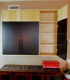 This is a perfect example of combining warm & rustic natural wood with slick  black  contemporary design. A beautiful mixture of  different textures i.e. two tone solid wood inset doors  & modern metal handles. The cabinet has the 3 adjustable shelves.