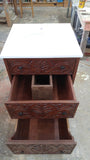 An absolutely gorgeous one of a kind  cabinet with hand carved rose wood drawer panels - converted into a bathroom vanity with a white quartz top and oval ceramic sink.  - 24" x 24" x 35" (ht)