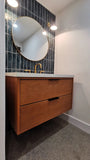 36" wide wall​ mounted / floating solid oak vanity built from solid white oak and stained teak color. ​ Design is inspired by Liz's love for MCM furniture - A​  ​modern ​clean​ &​​ ​streamlined look​ with two soft close drawers​ and 7"  black edge pulls.