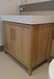 This gorgeous clean line bathroom vanity cabinet.  Custom designed & built to fit an existing floating vanity top.  Frame & door panels built from solid polar wood,  -34" x 20 " x 28" (ht)