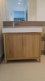This gorgeous clean line bathroom vanity cabinet was custom designed & built to fit an existing floating vanity top.  Frame & door panels built from solid polar wood,  -34" x 20 " x 28" (ht)