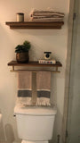 If you’re trying to add storage to a bathroom with limited space, chances are you don’t have enough room for a standing shelving, but you can still add shelving on the wall.  These wall mounted shelves are build from gorgeous walnut wood. Not only they added space to display & store but also to accommodated a towel rod.