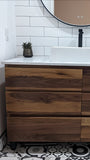 48" vanity cabinet is built from beautiful solid walnut wood , with exceptional grain pattern throughout.  Transforming the bathroom into an organic and contemporary space.    The vanity is made up of 6 soft close drawers with integrated lip handle - providing ample of storage space.  A perfect combination of functionality and style!