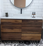 48" vanity cabinet is built from beautiful solid walnut wood , with exceptional grain pattern throughout.  Transforming the bathroom into an organic and contemporary space.    The vanity is made up of 6 soft close drawers with integrated lip handle - providing ample of storage space.  A perfect combination of functionality and style!